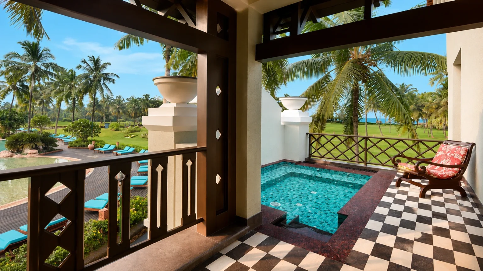 Private balcony plunge pool at ITC Grand Goa overlooking tropical gardens and resort landscapes.