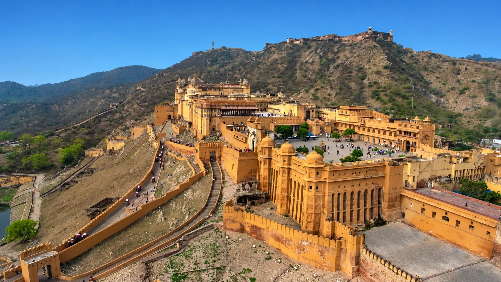 Aerial view of Amber Fort surrounded by the Aravalli Hills in Jaipur, Rajasthan