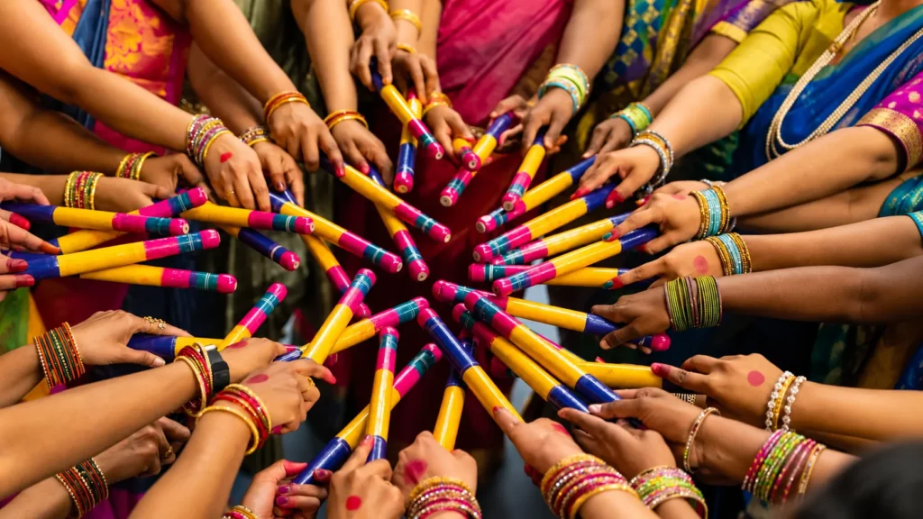 People playing colorful dandiya sticks together during a traditional Indian festive celebration